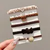 Gomas para el cabello estilo coreano Morandi en colores de caramelo dopamina, Bandas para el cabello duraderas y que no tiran, Cuerdas para el cabello de alambre de teléfono, Accesorios para el cabello