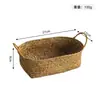 Cesta de almacenamiento ovalada tejida con hierba marina con asas, adecuada para frutas, bocadillos, huevos y organizar el desorden del escritorio.