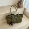 Bolsa de palha tecida minimalista de nicho estilo coreano transfronteiriça para mulheres, novo modelo 2026, grande capacidade, alto valor estético, bolsa de ombro e debaixo do braço