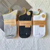 Calcetines nuevos de doble aguja para dama color sólido casual de algodón calcetines de otoño e invierno gruesos cálidos algodón peinado calcetines de mujer al por mayor