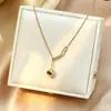Venta Caliente Cruzada Simple Acero de Titanio No se Desvanece Bola de Oro Pequeña Anillo Redondo Placa Redonda Lujo Ligero Exquisito Versátil Cadena para Clavícula Eslabón Grande
