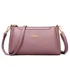Bolso de mano para mujer modelo nuevo 2026, bolso de mano de alta calidad para dama, bolso cruzado simple para el trabajo para mujeres de mediana edad, bolso para mamá, disponible para venta al por mayor