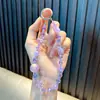 Lindo Colgante Llavero de Cristal con Cuentas de Flor Cadena Pequeña para Teléfono Cadena de Bolso Wholesale de Pequeños Productos de Yiwu