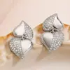 Aogu Venta Caliente Transfronteriza Moda Lujo Ligero Chapado en Oro de 18 Quilates Aretes de Amor con Circonita Diseño de Sentido para Mujer Nicho Pendientes de Alta Gama