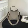 Bolso Cruzado de Hombro Único con Diseño de Nicho Estilo Coreano Bolso de Mano Tipo Cubo Modelo Nuevo 2026 con Textura de Lichi Casual Versátil