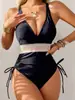 Traje de baño de una pieza estilo europeo y americano 2026, Bikini sexy ajustado para mujer, Comercio exterior transfronterizo, Al por mayor en stock
