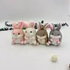 Nuevo llavero de peluche muñeco lanzable fabricantes de máquinas dispensadoras al por mayor dibujos animados mochila escolar muñeco de 4 pulgadas colgante regalo