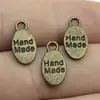 15X8Mm 0,6g Cor Bronze Antigo Acessórios de Joia para Exportação Pingente Feito à Mão com Letra em Inglês