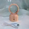 Lâmpada Giratória Base de Cristal com Gravação Interna 3D Luz Noturna Luminosa Caixa de Música LED Presente Criativo Venda por Atacado