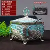 Modelo auténtico nuevo, ya disponible: Botes de caramelo cuadrados de metal con diseño de mariposa y pavo real, en stock para entrega inmediata, con un recipiente interior de vidrio para higiene y protección ambiental