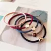 Versión coreana de simple anillo de pelo de cuentas planas grandes cuerda para el cabello linda chica Mori lazo de goma para el cabello Joker no daña la cuerda del cabello al por mayor