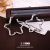 Pendientes de Estrella de Cinco Puntas de Plata Rota de Venta Caliente Europeos y Americanos Pendientes de Diseño Giratorio Retro de Nicho Pendientes Sencillos de Moda