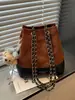 Bolso moderno y de moda con un toque exclusivo y de nicho, bolso de axila para mujer, nuevo bolso de hombro versátil vintage para mujer Otoño 2025