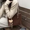 Bolso de mano retro de alta gama para mujer, nueva colección de otoño 2026, lujo ligero, diseño de nicho, bolsa tote de gran capacidad para ir al trabajo, bolso de hombro