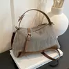 Bolso de mano tejido simple transfronterizo para mujer, nuevo estilo verano 2026, bolso de hombro y bandolera de moda para el día a día con bloqueo de color