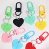 Colgante de Metal con Forma de Corazón Inglés Colorido Llavero Color Caramelo Accesorio con Forma de Corazón Hebilla de Puerta Decoración DIY