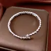Pulsera Abierta Redonda de Zirconia Galvanizada en Oro Real de 18 Quilates, Estilo Simple y Lujoso, Joyería de Alta Gama Moderna y Elegante para Mujeres