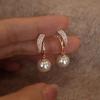 Pendientes de perlas y diamantes de imitación de lujo para mujer, diseño de nicho, sin orificios, 2024, nuevos y explosivos, sencillos.