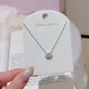 Colar minimalista de zircônia oval, corrente de clavícula de nicho de luxo leve, colar requintado e versátil para o trajeto diário