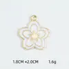 Joyería de aleación estilo coreano Accesorios diy Flor de cerezo Flor de cinco pétalos Colgante de collar Pulsera Colgante individual Colgante pequeño Colgante individual Venta al por mayor