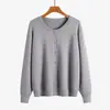 Nuevo cárdigan de punto de manga larga con cuello redondo para otoño e invierno, estilo coreano, elegante y versátil, chaqueta de moda de color liso, corte holgado casual