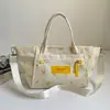 Bolso de Hombro de Lona Nuevo Diseño de Nicho 2026 Versión Coreana Bolso Tote de Nicho para Mujer Ligero Bolso de Hombro Sencillo