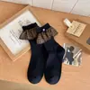 Calcetines versátiles de estilo coreano para mujer con botón ins, hasta la mitad de la pantorrilla, nuevos para otoño, calcetines holgados de cuadros dulces con encaje, estilo universitario
