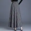Moda Femenina Versátil de Lana a Cuadros de Cintura Alta Línea A Acampanada Falda Nueva Otoño/Invierno 2026