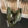 Bolsa de tela camuflada para mujer, nueva moda de primavera 2026, adecuada para la escuela y el trabajo, bolso de hombro de gran capacidad, bolso cruzado tipo dumpling