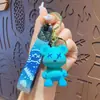 Llavero Creativo de Oso que Cambia de Color Cielo Estrellado al por Mayor Llavero de Coche para Parejas Colgante Exquisito para Bolsos de Mujer Versátil