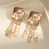 Pendientes Metálicos Exagerados de Forma Irregular de Gota de Agua Europeos y Americanos para Mujer Pendiente de Flor de Ola de Industria Pesada de Nicho Accesorio de Concha de Pulpo Venta al por Mayor