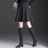 Falda de lana simple y elegante para mujer, nuevo modelo otoño 2026, de cintura alta, adelgazante, reductora de edad, falda de paraguas en línea A