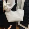 Bolsa de mão minimalista com uma vibe outonal de nicho, trama estampada 2026, nova e estilosa bolsa de ombro feminina para o dia a dia, sacola da moda
