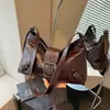 Bolso de hombro tipo tote de nicho estilo coreano para mujer, nueva colección otoño 2026, bolso de motocicleta de alta gama, bolso cruzado para el día a día