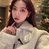 Nuevos Pendientes Asimétricos de Viento Navideño 2022 Diseño de Nicho Femenino Clip de Oreja de Perla con Aguja de Plata S925 Joyería al por Mayor