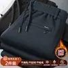 Pantalones casuales de otoño e invierno, forrados de polar y engrosados, pantalones rectos para hombre, corte holgado con cordón, pantalones largos versátiles, pantalones cálidos de invierno para hombre