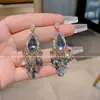 Pendientes de Borla de Cristal Gota de Industria Pesada con Sentido de Alta Gama Moda Étnica Blancos Largos Atmósfera Exquisita Mujeres