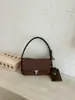 Bolso de axila de nicho de moda para mujer, estilo nuevo, nicho francés, bolso de mano para salir, bolso cruzado de un solo hombro simple retro