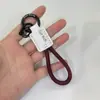 Colgante Llavero de Cuerda Exquisito Tejido a Mano con Logo Personalizado, Llavero de Cuero Genuino para Coche, Pequeño Regalo Universal al por Mayor