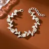 Pulseras florales de pedrería europeas y americanas transfronterizas, un artículo superventas en AliExpress, con un diseño sencillo hecho a mano con pedrería incrustada, directamente del fabricante, en un estilo fresco y dulce