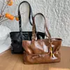 2026 Nueva Hebilla de Cinturón de Moda Versátil Coreana de Nicho Bolso de Mujer Casual de Mano para Hombro Debajo del Brazo de Moda