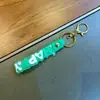 Chaveiro Transparente Versátil Feliz com Pingente de Tira de Couro Pulseira de PVC Acessório de Chaveiro Acessório de Boneca Cordão