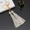 Amazon pulsera de silicona borla colgante cerrado cuero doble borla llavero colgante de bolso al por mayor