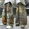 Ropa infantil jeans para niños 2026 nuevo estilo coreano dibujos animados pantalones largos para niños mayores, elegantes pantalones de primavera y otoño para niños