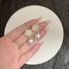 Nuevos Pendientes Estilo Chino Retro Palacio Geométricos Rombos Incrustados con Piedras Ojo de Gato Goteo de Aceite Joyería de Oreja Niche Suave y Simple