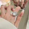 Nuevo anillo de calcedonia blanca de estilo chino con forma de huevo para mujer, diseño de nicho, ligero y lujoso, anillo ajustable para dedo.