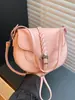 Bolso de axila para mujer transfronterizo, modelo nuevo 2026, moderno, de alta gama, lujo ligero, bolso de hombro nicho para commuting, bolso cruzado vintage
