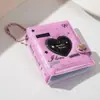 Nuevo colgante de mini álbum de fotos en forma de corazón, álbum pequeño de 2 pulgadas para tarjetas para guardar fotos de ídolos y álbum de fotos instantáneas portátil