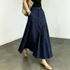 Nicho, discreta, azul marinho, saia evasê, verão 2026, elegante, formato pera, disfarça imperfeições, emagrecedora, versátil, saia com barra larga