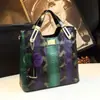 Bolsa Maternidade de Couro Genuíno com Padrão de Cobra de Alto Padrão 2026, Novo Estilo, Bolsa de Mão Luxuosa e Elegante para Mulheres de Meia-Idade